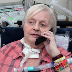 Patient with PMV007 inline talking on a cellphone